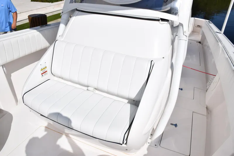 Slide: The Image of White seating on 2017 Intrepid 327 boat, showcasing sleek design and comfort. - 12