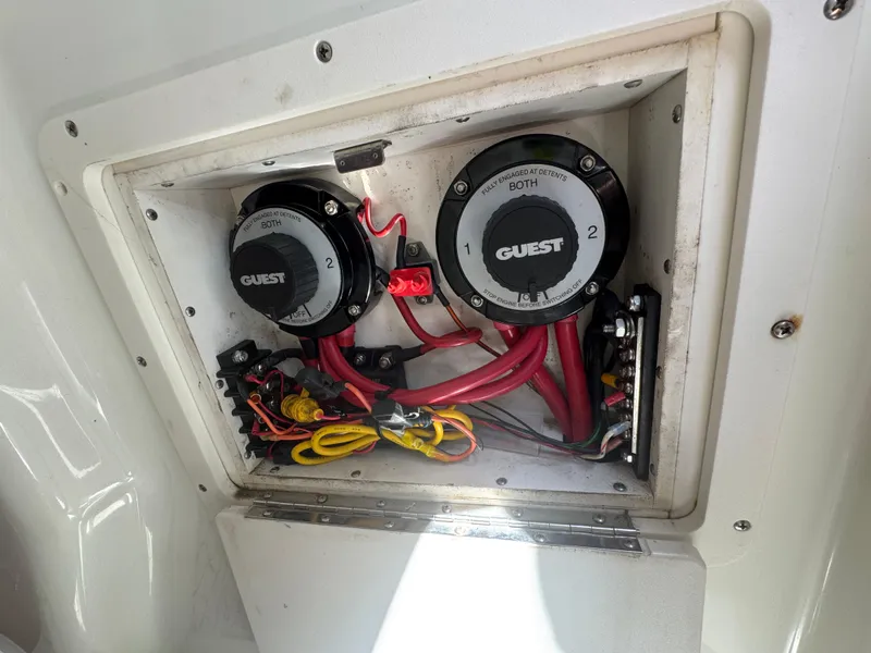 Slide: The Image of Electrical panel with dual battery switches on a 2003 Triton 2690 CC boat. - 32