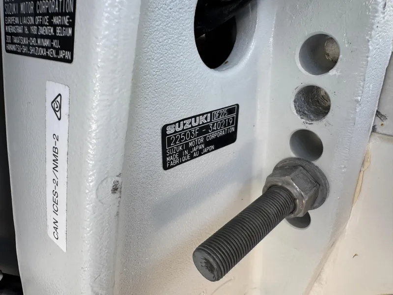 Slide: The Image of Close-up of Suzuki motor serial number plate on a 2003 Triton 2690 CC boat. - 41