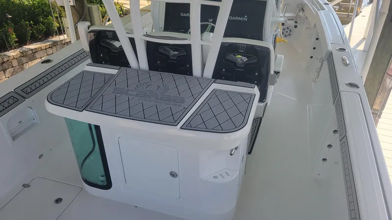 Slide: The Image of 2023 Wellcraft 352 Fisherman boat interior with modern console and seating. - 16