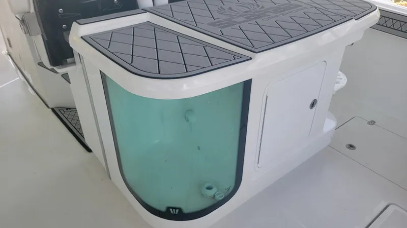 Slide: The Image of 2023 Wellcraft 352 Fisherman boat livewell and storage compartment. - 20