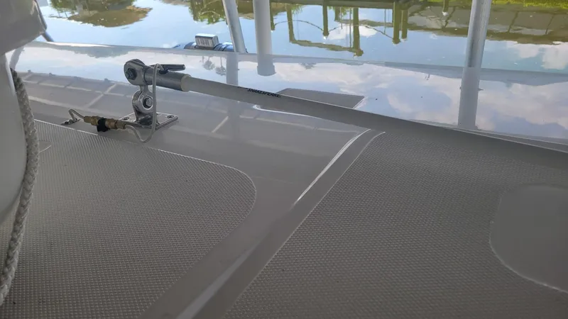 Slide: The Image of 2023 Wellcraft 352 Fisherman deck with sleek design and reflective surface. - 26