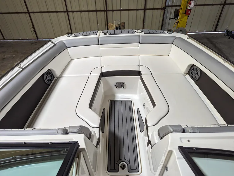 Slide: The Image of 2017 Sea Ray SDX 270 boat interior with spacious seating and sleek design. - 13
