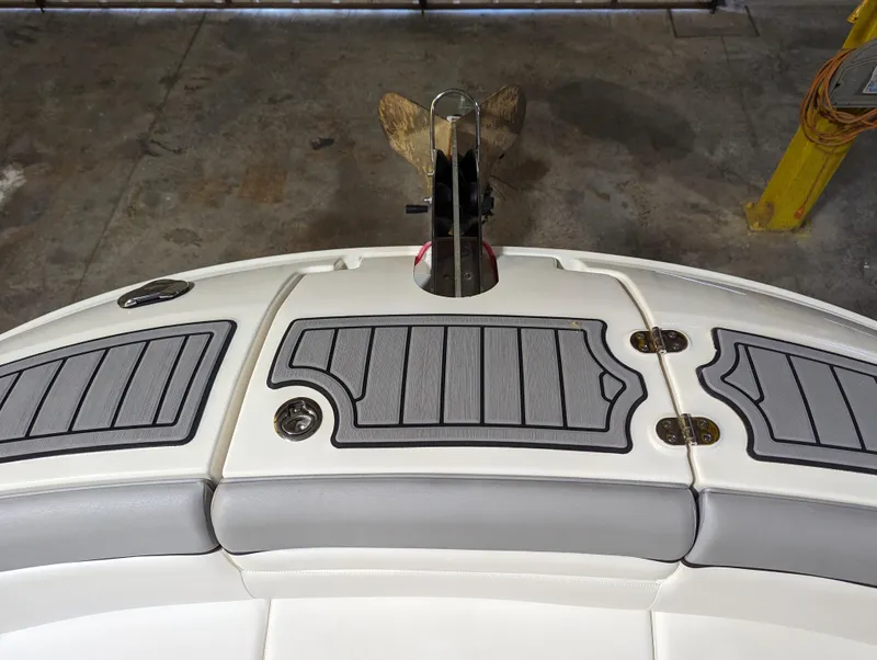 Slide: The Image of 2017 Sea Ray SDX 270 boat deck with gray non-slip padding and stainless steel fittings. - 15