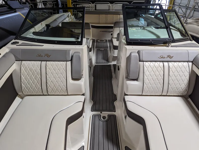 Slide: The Image of 2017 Sea Ray SDX 270 boat interior with luxurious seating and modern design. - 16