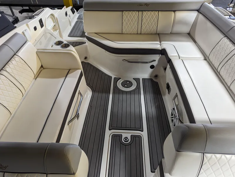 Slide: The Image of 2017 Sea Ray SDX 270 interior with luxurious seating and sleek flooring. - 21