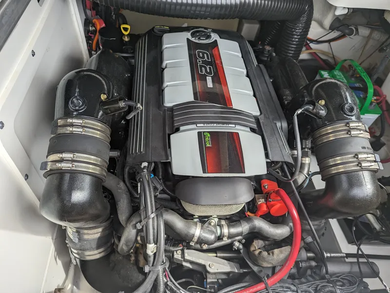 Slide: The Image of Engine compartment of a 2017 Sea Ray SDX 270 boat, featuring a powerful 6.2L engine. - 30
