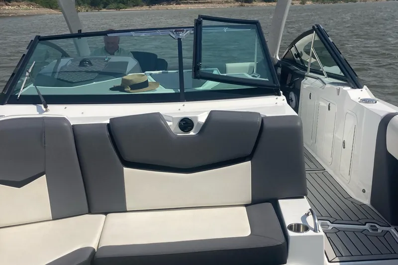 Slide: The Image of 2019 Cruisers Yachts 338 boat interior with seating and open deck. - 8
