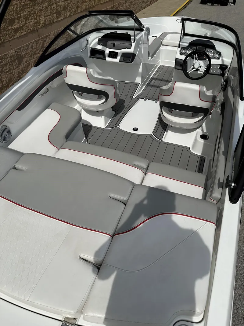 Slide: The Image of 2021 Tahoe 700 boat interior with sleek seating and modern design. - 11