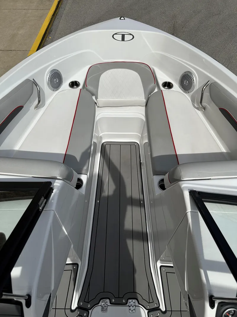 Slide: The Image of 2021 Tahoe 700 boat interior with sleek seating and modern design. - 8