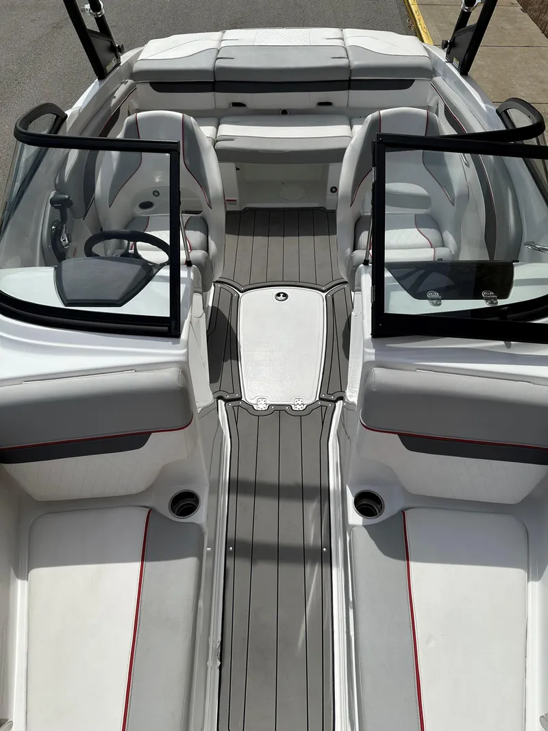 Slide: The Image of 2021 Tahoe 700 boat interior with sleek seating and modern design. - 9