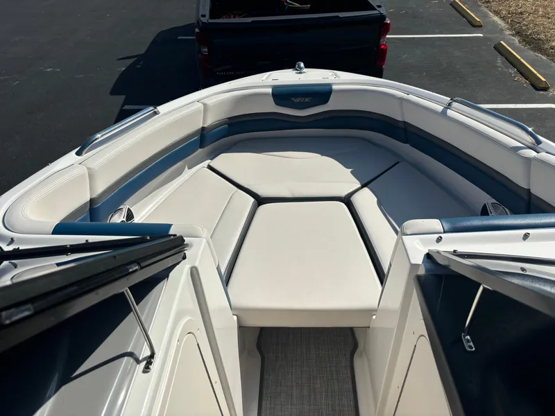 Slide: The Image of 2016 Chaparral Vortex 203 VRX boat interior with cushioned seating and open bow design. - 11