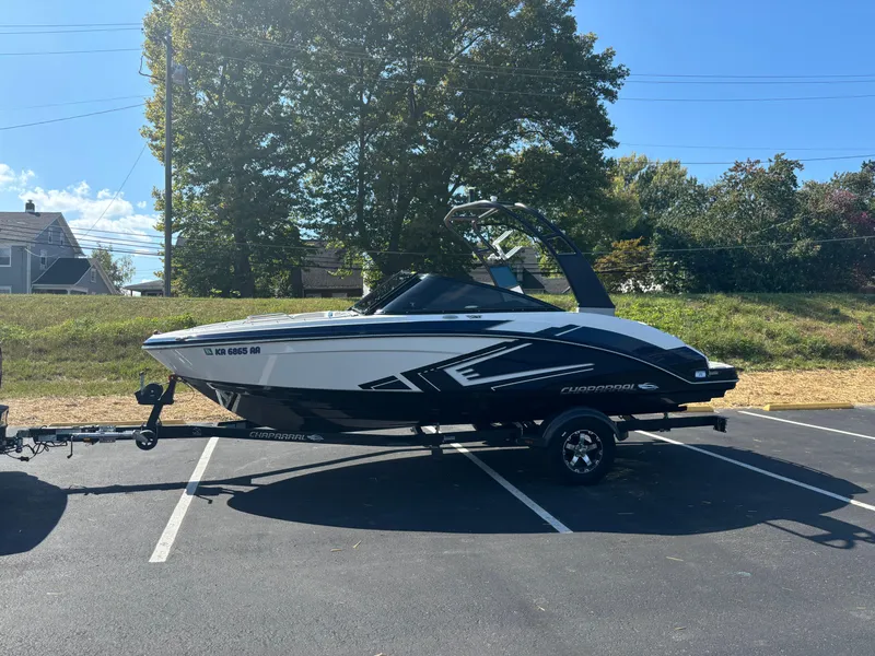 Slide: The Image of 2016 Chaparral Vortex 203 VRX boat on trailer in parking lot. - 5