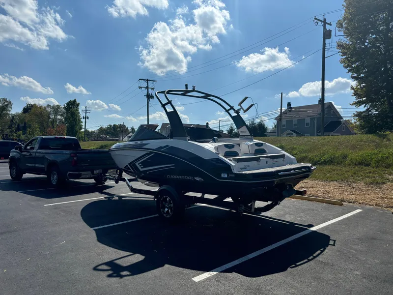 Slide: The Image of 2016 Chaparral Vortex 203 VRX boat on trailer in parking lot, sunny day. - 6