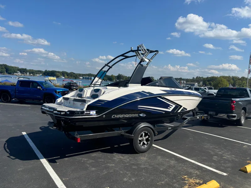 Slide: The Image of 2016 Chaparral Vortex 203 VRX boat on trailer in parking lot. - 8