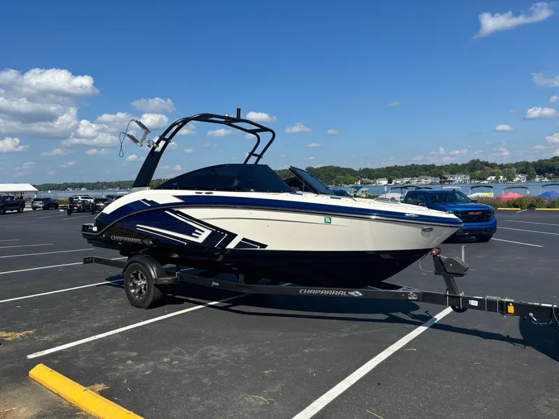 Slide: The Image of 2016 Chaparral Vortex 203 VRX boat on trailer in parking lot. - 9