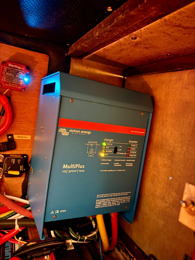 Slide: The Image of Victron Energy MultiPlus inverter in 1983 Tayana 52 Aft Cockpit sailboat. - 36