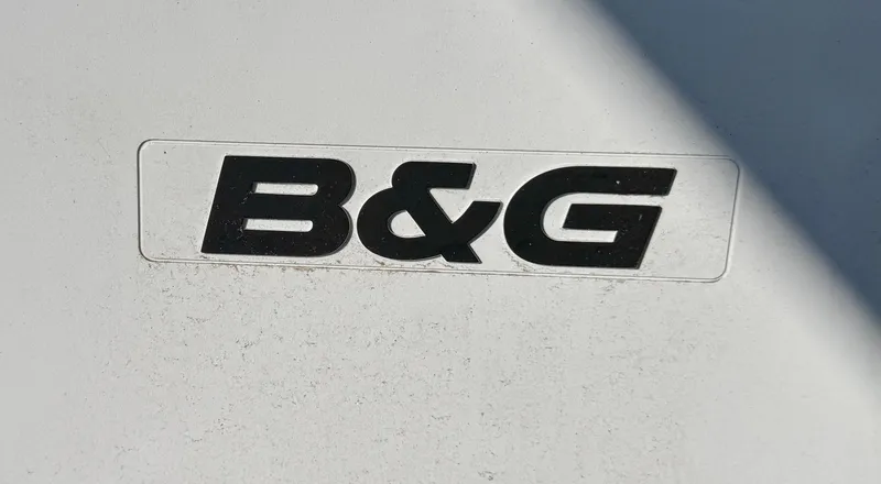 Slide: The Image of B&G logo on 1983 Tayana 52 Aft Cockpit yacht surface. - 38