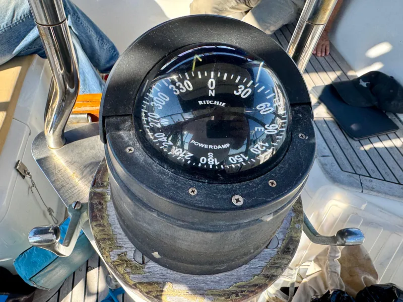 Slide: The Image of Compass on 1983 Tayana 52 Aft Cockpit sailboat, showing navigation details. - 40