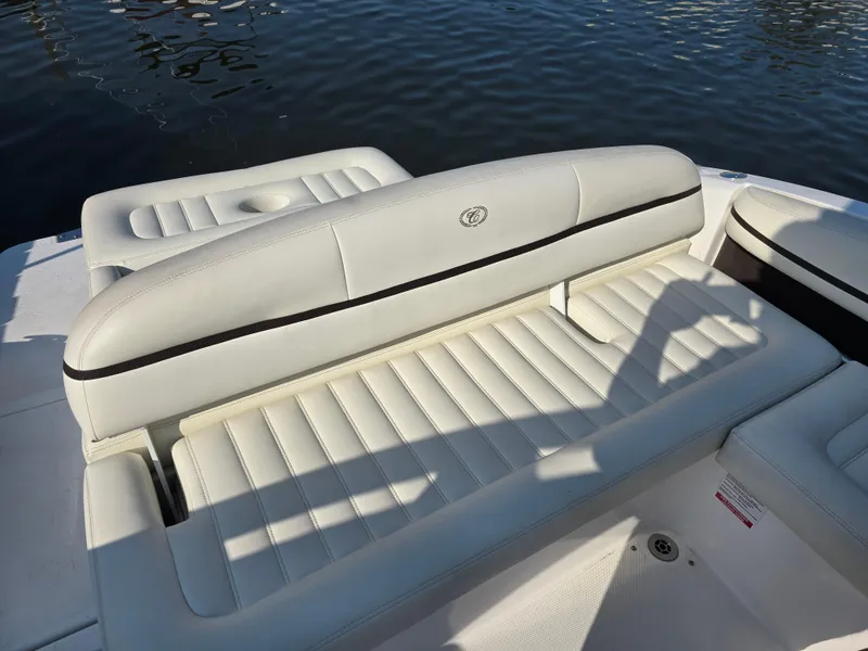 Slide: The Image of 2015 Cobalt R7 boat with white leather seating on calm water. - 8