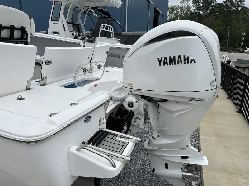 Slide: The Image of Tidewater 2500 Carolina Bay boat with Yamaha outboard motor, 2025 model. - 13