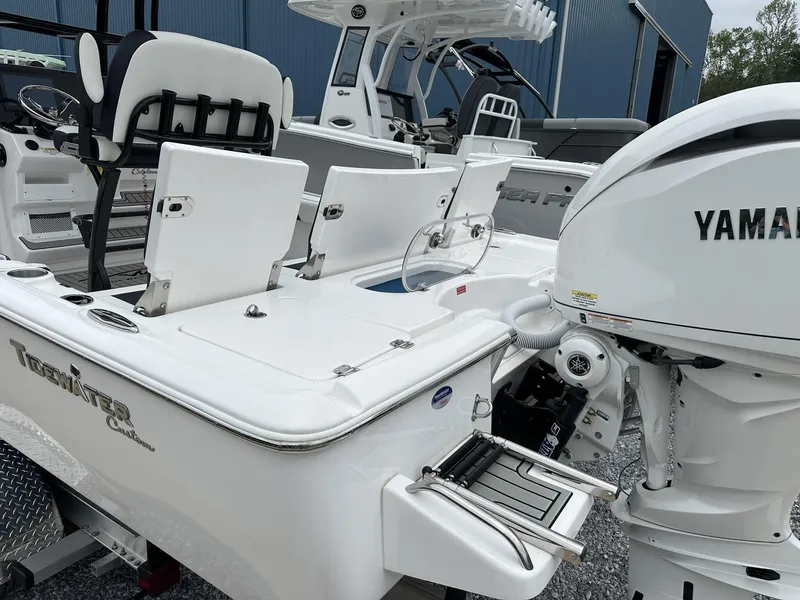 Slide: The Image of 2025 Tidewater 2500 Carolina Bay boat with Yamaha engine, featuring second station and seating. - 14