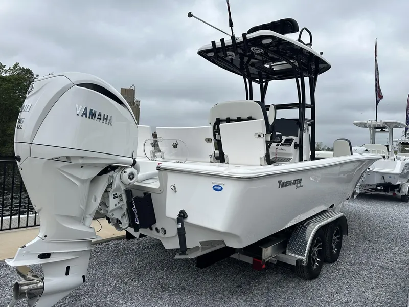 Slide: The Image of 2025 Tidewater 2500 Carolina Bay boat with Yamaha engine, displayed on a trailer. - 17