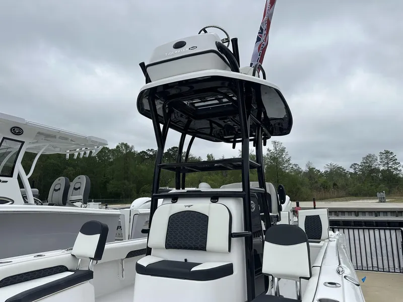 Slide: The Image of 2025 Tidewater 2500 Carolina Bay boat with second station, docked outdoors. - 4