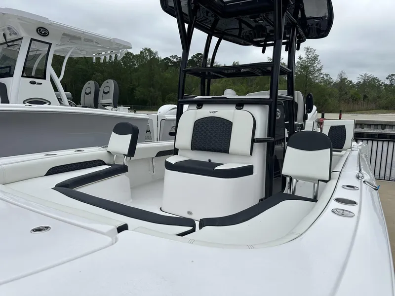 Slide: The Image of 2025 Tidewater 2500 Carolina Bay boat with second station, featuring sleek seating and modern design. - 5