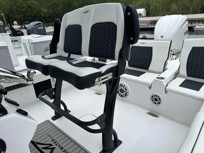 Slide: The Image of 2025 Tidewater 2500 Carolina Bay boat interior with dual seating and second station. - 8
