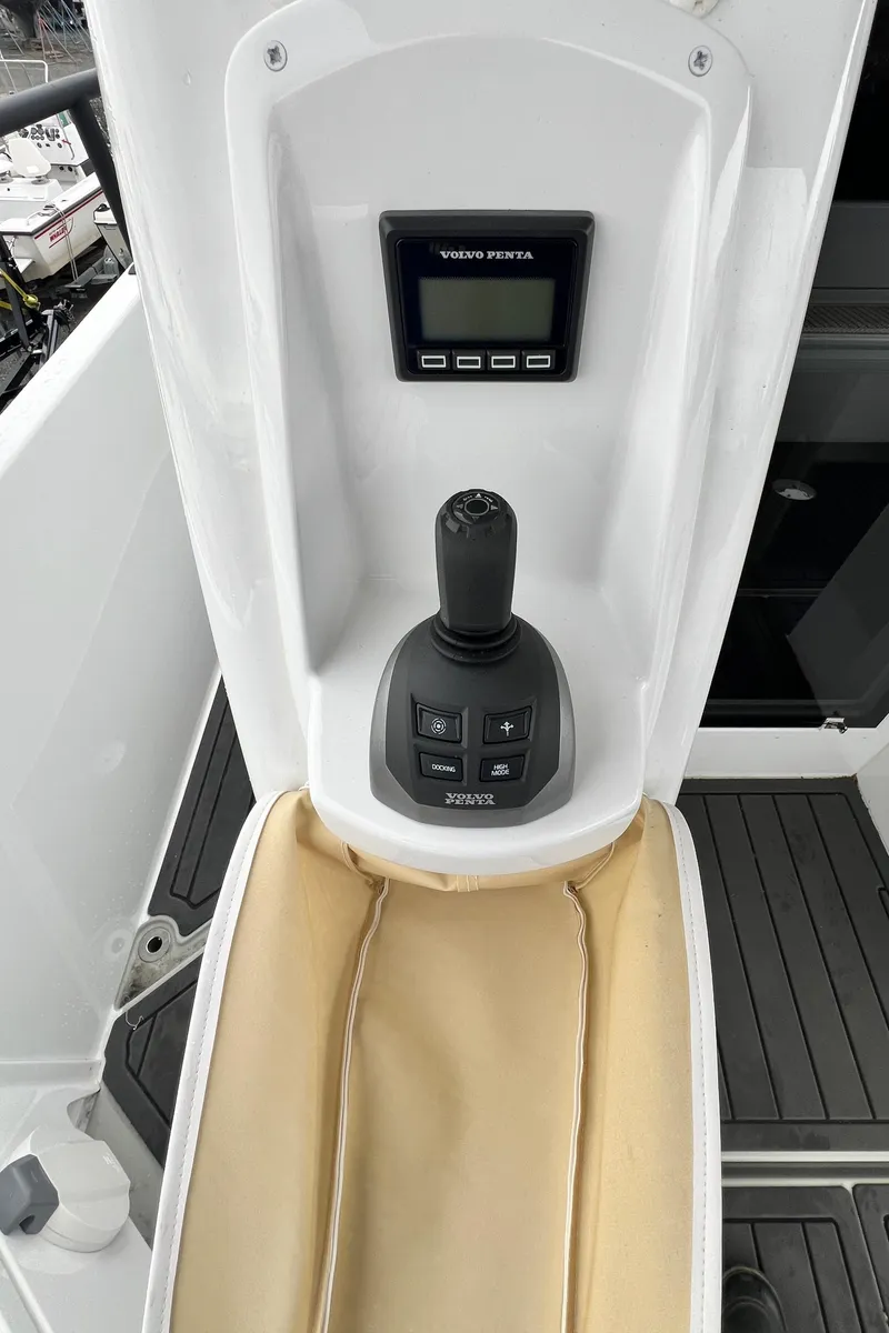 Slide: The Image of 2024 Sargo 36 Explorer control panel with joystick and display. - 24