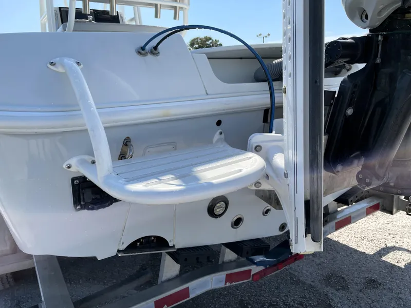 Slide: The Image of 2015 Contender 25 Bay boat with swim platform and motor mount. - 16