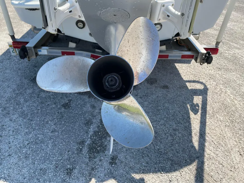 Slide: The Image of Propeller of a 2015 Contender 25 Bay boat on a trailer. - 18