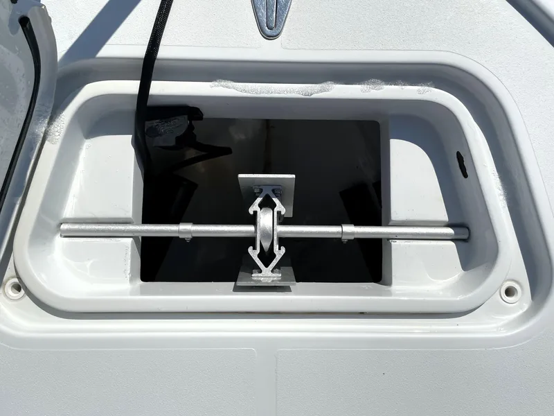 Slide: The Image of Anchor storage compartment on 2015 Contender 25 Bay boat. - 30
