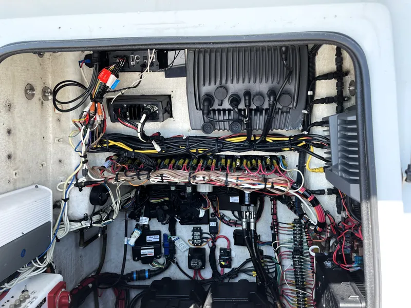 Slide: The Image of 2015 Contender 25 Bay boat electrical wiring system with organized cables and components. - 40