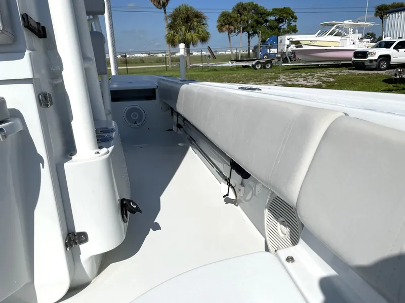 Slide: The Image of 2015 Contender 25 Bay boat interior with seating and storage. - 44