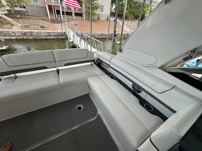 Slide: The Image of 2016 Formula 330 Crossover Bowrider interior with spacious seating and sleek design. - 27