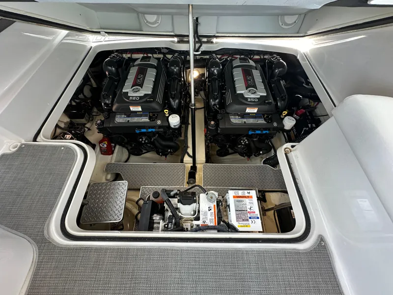 Slide: The Image of 2016 Formula 330 Crossover Bowrider engine compartment with dual engines. - 29