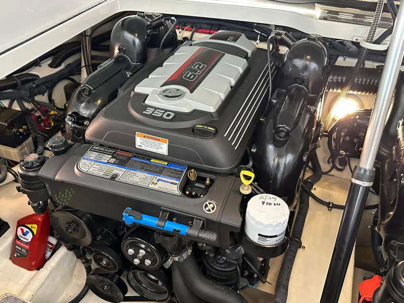 Slide: The Image of 2016 Formula 330 Crossover Bowrider engine compartment with 6.2L 350 HP engine. - 31