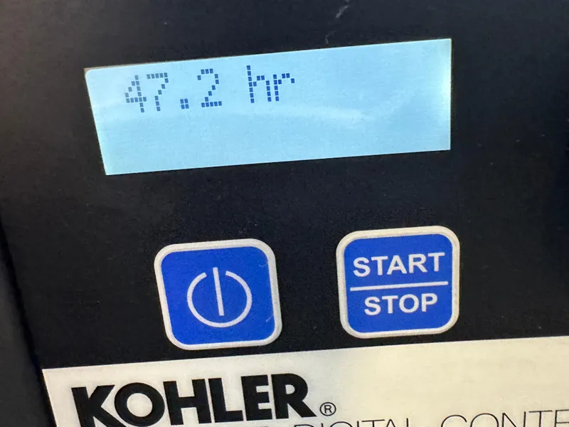 Slide: The Image of Kohler digital control panel displaying 47.2 hours, with power and start/stop buttons. - 33
