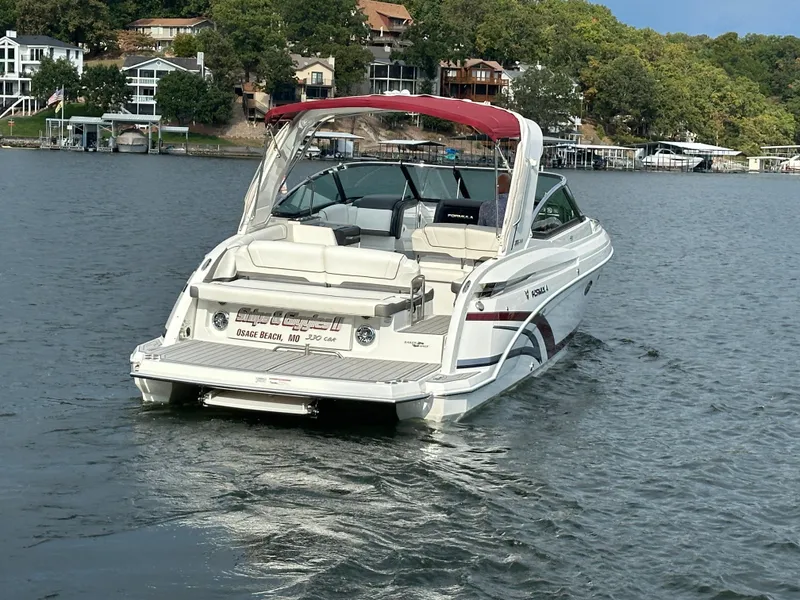 Slide: The Image of 2016 Formula 330 Crossover Bowrider on a scenic lake. - 45
