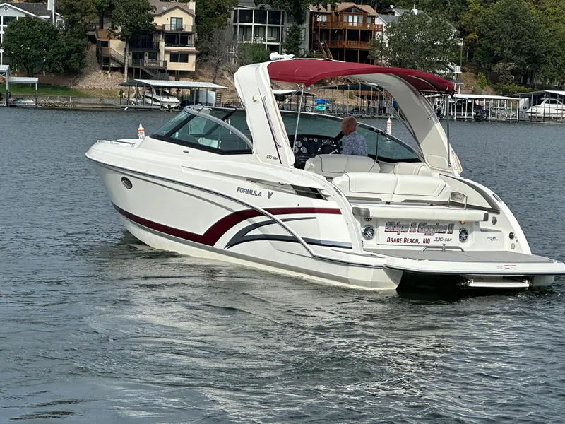 Slide: The Image of 2016 Formula 330 Crossover Bowrider on a scenic lake. - 48