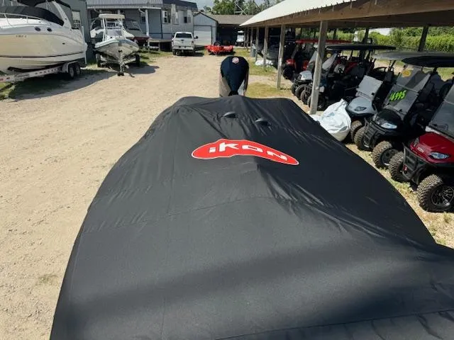 Slide: The Image of Bow of iKon VLX21 boat, featuring a trolling motor and sleek design, 2025 model. - 10