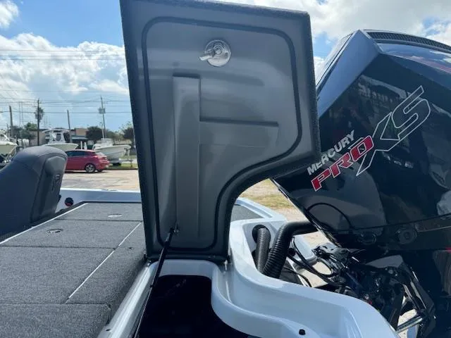 Slide: The Image of Interior of 2025 iKon VLX21 boat with dual gray seats and steering console. - 17