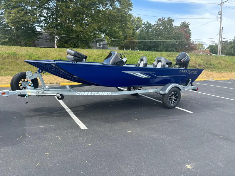 Slide: The Image of 2025 Crestliner 1600 Storm boat on trailer in parking lot. - 6