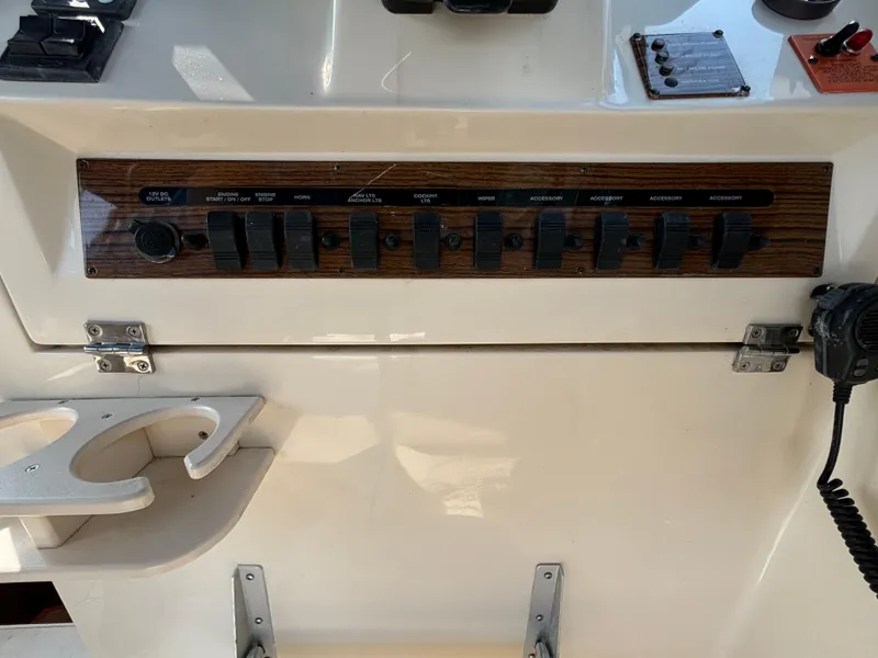 Slide: The Image of Control panel of a 2005 Mainship Pilot 30-II Sedan boat. - 26