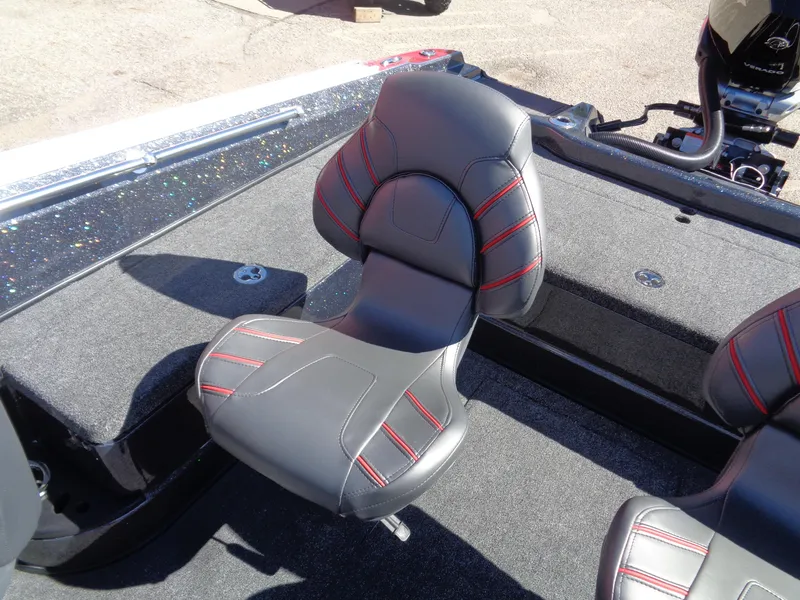 Slide: The Image of 2024 Nitro ZV20 Pro boat seat with red accents, gray upholstery, and spacious deck. - 14