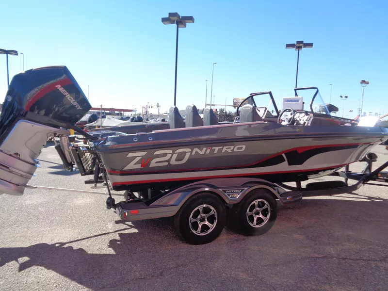 Slide: The Image of 2024 Nitro ZV20 Pro boat on trailer in outdoor showroom. - 3