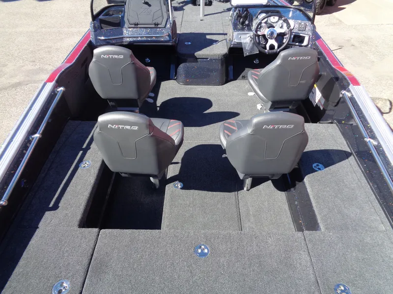 Slide: The Image of 2024 Nitro ZV20 Pro boat interior with four seats and steering console. - 6
