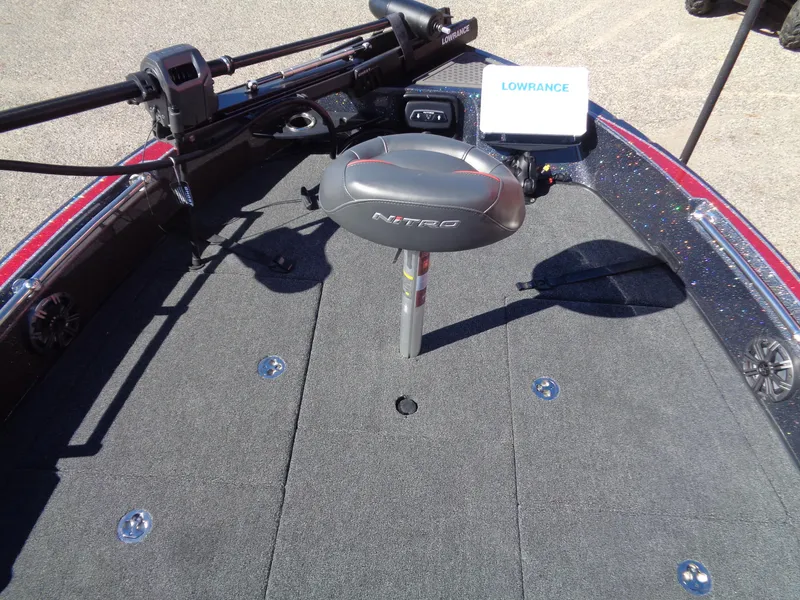 Slide: The Image of 2024 Nitro ZV20 Pro boat deck with Lowrance electronics and fishing seat. - 8